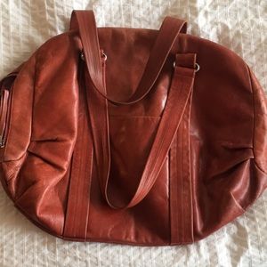 Red leather weekend bag